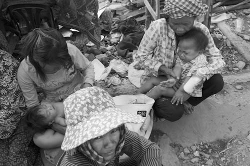 CAMBODIA. Phnom Penh. 4/01/2012: Mothers and their children stranded the day after the final eviction of the Borei Keila community.