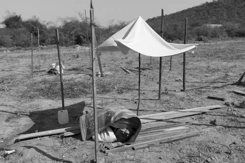 CAMBODIA. Phnom Da, Oudong (Kandal). 6/01/2012: Makeshift shelter at forced relocation site made from bits and pieces salvaged during the Borei Keila eviction.