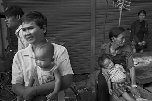 CAMBODIA. Phnom Penh. 29/02/2012: Evicted Borei Keila residents have sought a temporary refuge in the market stalls underneath the buildings built by the company which evicted them.