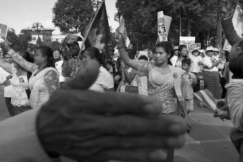 CAMBODIA. Phnom Penh. 8/03/2012: Police diverting demonstration of Boeung Kak Lake and Borei Keila residents joining in celebration of Women's Day.