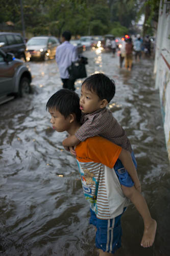 CAMBODIA. Phnom Penh. 8/05/2012: Flooded streets in Boeung Keng Kang area after first rains of the season.