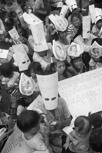 CAMBODIA. Phnom Penh. 8/06/2012: The Children of the Boeung Kak Lake community demonstrate in front of the Senate, pushing to free their mothers who were sentenced to 2 1/2 years of prison after a 2 hour trial.