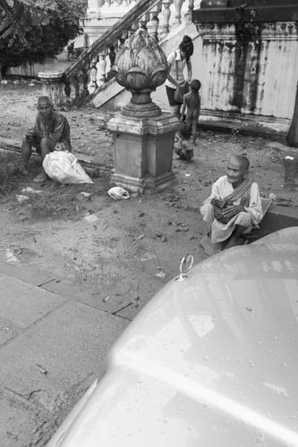 CAMBODIA. Phnom Penh. 7/10/2012: Beggars during Pchum Ben celebrations at Wat Svay Poper.