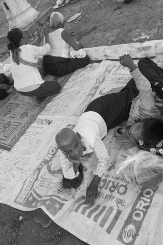 CAMBODIA. Phnom Penh. 29/10/2012: People resting in front of the Royal Palace on the 15th day of the death of King Norodom Sihanouk.