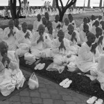 CAMBODIA. Phnom Penh. 26/01/2013: Nuns praying after the second rehearsal of the procession for the cremation of King Norodom Sihanouk.