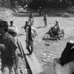 CAMBODIA. Veun Sai (Ratanakkiri). 21/02/2013: Villagers boarding the ferry to cross the Sesan river. Three dams are planned on the Cambodian part of the Sesan river alone.