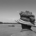 CAMBODIA. Veun Sai (Ratanakkiri). 21/02/2013: Villager on the ferry to cross the Sesan river. Three dams are planned on the Cambodian part of the Sesan river alone. With two more on the Srepok and two on the Preak Leang, the construction of seven dams will considerably alter the ecosystem.