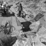 CAMBODIA. Veun Sai (Ratanakkiri). 21/02/2013: Villagers and pot peddlers disembarking the ferry to cross the Sesan river.