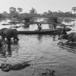 CAMBODIA. Sre Kor (Stung Treng). 27/02/2013: Evening bath in the Sesan river. The Sesan2 dam will be built downstream and the village will be flooded by the water from the reservoir.