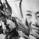 CAMBODIA. Phnom Penh. 6/03/2013: Supporters outside the Appeals Court at the trial of Mam Sonando, 71 years, sentenced to 20 years of imprisonment for supporting a so-called secessionist movement.