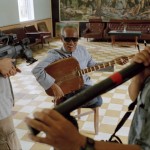 CAMBODIA. Phnom Penh. 11/05/2001: Mr Rithy Panh, film director, filming Mr. Kong Nay, singer, in S21 prison (Tuol Sleng) where 15,000 people were executed during Pol Pot regime.