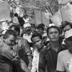 CAMBODIA, Phnom Penh. 20/05/2013: Militants of the CNRP (Cambodian National Rescue Party) blocked by a police cordon in front of the European Union Delegation offices.