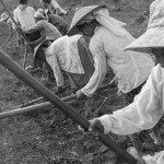 MYANMAR, Ksieng Tong (Shan State). 29/04/2013: Members of one landless Akha family from the Phen Tha village, tilling the land for a Shan-owned rubber plantation on which they will be allowed to grow 'mountain rice' for free.