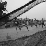 MYANMAR, Tachileik (Shan State). 2/05/2013: Akha boys playing football in the Parlyan neighbourhood. The Akha have established themselves here before a major influx of Burmese the last ten years. Tachileik grew from 100,000 to 300,000 inhabitants.