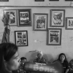 CAMBODIA, Phnom Penh. 4/07/2013: Boeung Kak Lake members in their community room decorated with photographs of their numerous demonstrations, preparing a press conference following allegations of corruption and dissension within the group, triggered by a series of films with an unclear origin posted on Youtube.