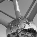 BELGIUM. Brussels. 29/07/2013: Tourists at the foot of the Atomium, built in 1958 for the Universal Exhibition.
