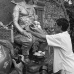 CAMBODIA. Phnom Penh. 20/09/2013: Prince Sisowath Thomico, Member of the CNRP, prays in front of a statue of King Sisowath as the initial plan to start a hunger strike in front of the Royal Palace and end it until there is a sign that a resolution can be found regarding an independent investigation in the 2013 elections frauds had to be moved to Wat Phnom.