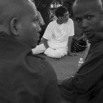 CAMBODIA. Phnom Penh. 20/09/2013: Prince Sisowath Thomico, Member of the CNRP, talks to monks at Wat Phnom as the initial plan to start a hunger strike in front of the Royal Palace was thwarted by the police blocking access to Sisowath Quay. He plans to end it until there is a sign that a resolution can be found regarding an independent investigation in the 2013 elections frauds.