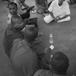 CAMBODIA. Phnom Penh. 20/09/2013: Prince Sisowath Thomico, Member of the CNRP, talks to monks at Wat Phnom as the initial plan to start a hunger strike in front of the Royal Palace was thwarted by the police blocking access to Sisowath Quay. He plans to end it until there is a sign that a resolution can be found regarding an independent investigation in the 2013 elections frauds.