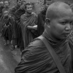 CAMBODIA. Phnom Penh. 7/10/2013: The Boeung Kak lake community invites about 150 monks to receive offerings to purify them from the violent crackdown by thugs and police during a peacefull hunger strike at Wat Phnom on September 22nd.