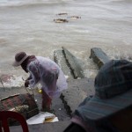 CAMBODIA. Kep. 5/10/2013: Rainy day at Psah Kdam ( Crab Market) on the last day of Pchum Ben.