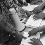 CAMBODIA. Phnom Penh. 6/10/2013: People thumbprint a petition asking for the 1991 Paris Peace Accords to be respected when the opposition CNRP supporters attend a 'public forum' at 'Freedom Place', two weeks after the CNRP boycotted the opening ceremony of the 2013 legislature.