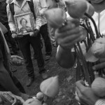 CAMBODIA. Phnom Penh. 18/10/2013: Photograph of Mao Sok Chan who was fatally shot during the aftermath of September 15th opposition CNRP demonstration, carried by a member of a youth movement which attempts to hold a prayer in his memory at Wat Phnom