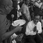CAMBODIA. Phnom Penh. 23/10/2013: Sam Rainsy, CNRP President, being blessed by a monk on the first of a 3 day demonstration by the opposition CNRP to protest the 2013 legislative elections results and to demand an implementation of the 1991 Paris Peace Accords.