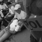 CAMBODIA. Phnom Penh. 17/10/2013: A Borei Keila community member resting at a demonstration in front of the Phnom Penh Municipality for a solution to their eviction in January 2012.