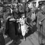 CAMBODIA. Phnom Penh. 22/11/2013: Monks and son of land rights activist Yorm Bopha due to appear at the Supreme Court for her last appeal, march to ask for her release.