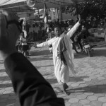 CAMBODIA. Phnom Penh. 20/12/2013: Woman trying to communicate with the spirits on the 6th day of demonstrations by the opposition CNRP supporters to have Prime Minister Hun Sen step away from power after 28 years, following the 2013 Cambodian elections.