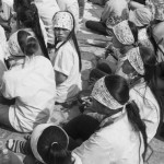 CAMBODIA. Phnom Penh. 25/12/2013: Factory workers gather at Freedom Place, one day after the announcement by the government of a 15$ wage rise for the garment sector stirred discontent as the workers want an 80$ increase, giving the opposition CNRP a platform for its political demands.