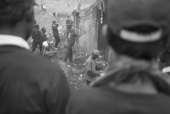 CAMBODIA. Phnom Penh. 24/01/2009: Hired workers destroying private property under police protection during final eviction of Dey Krohom.