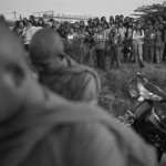 CAMBODIA. Phnom Penh.02/01/2014: Workers at The Yakjin factory who were dispersed in the morning by members of Unit 911 from the RCAF organise a roadblock on Road Nr 4. Voan Pov, Union Leader, and three monks were beaten and arrested earlier during the protest.