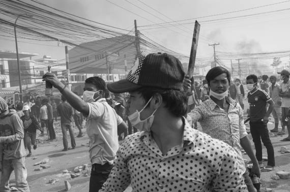 CAMBODIA. Phnom Penh.3/01/2014: Striking workers who pulled up barricades on Veng Sreng road defying armed forces before being brutally dispersed, resulting in at least 3 dead, one badly injured and 3 confirmed arrests.