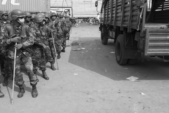 CAMBODIA. Phnom Penh.4/01/2014: Arrival of heavily armed military to replace the Gendarmerie after the violent crackdown on garment workers strike of the day before at Veng Sreng road in the industrial area of Phnom Penh.