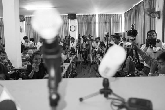 CAMBODIA. Phnom Penh. 7/01/2014: Journalists at a press conference at the opposition CNRP headquarters announcing a complaint will be lodged against the Cambodian government at the ICC regarding the cracdkown and subsequent killing of striking workers on January 3rd.