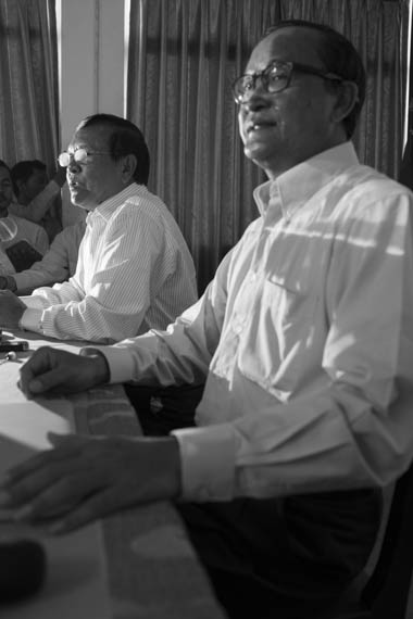 CAMBODIA. Phnom Penh. 7/01/2014: Kem Sokha and Sam Rainsy, CNRP co-Presidents, at a press conference at the opposition CNRP headquarters announcing a complaint will be lodged against the Cambodian government at the ICC regarding the cracdkown and subsequent killing of striking workers on January 3rd.