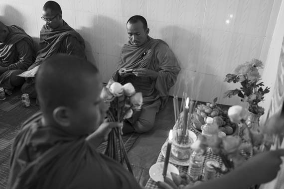 CAMBODIA. Phnom Penh. 10/01/2014: Buddhist monks at a ceremony for the crackdown victims, followed by a press conference at Solidarity House requesting the release of the 23 arrested during the latest crackdown on striking factory workers, a halt to violence and a salary rise to 160$.