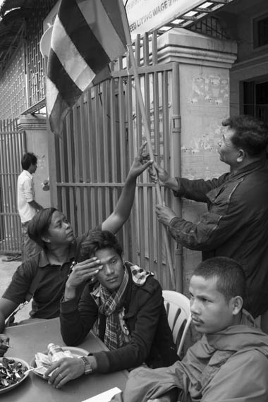 CAMBODIA. Phnom Penh. 10/01/2014: Mourning ribbons sold at a ceremony for the crackdown victims, followed by a press conference by union leaders at Solidarity House requesting the release of the 23 arrested during the latest crackdown on striking factory workers, a halt to violence and a salary rise to 160$.