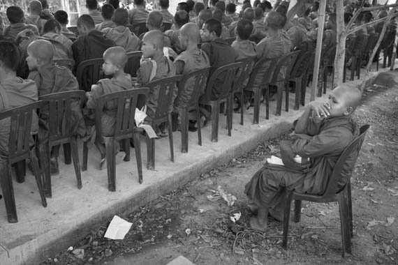 CAMBODIA. Phnom Penh. 16/01/2014: Second day in a ceremony organised by the Boeung Kak lake community with over 200 monks to commemorate 4 garment workers who were killed during the violent military crackdown of January 3rd on striking workers.