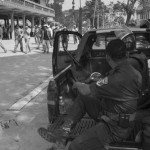 CAMBODIA. Treuy Sla (Kandal). 21/01/2014: CPP sympathisers, mostly from outside the commune, and riot police occupy the grounds, forcing the opposition CNRP to cancel a planned gathering with Sam Rainsy and Kem Sokha, CNRP co-presidents, and villagers.