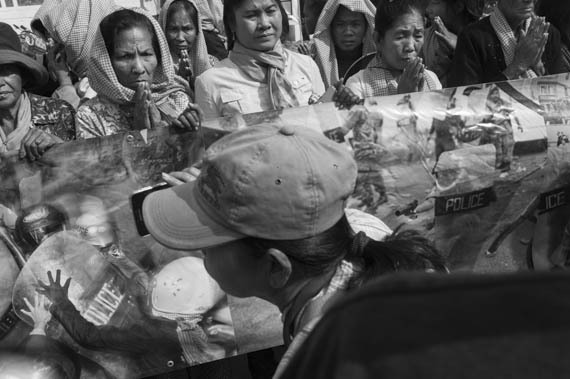 CAMBODIA. Phnom Penh. 24/01/2014: The community of Dey Krohom, which saw its final eviction on this same day of 2009, holds a commemorative ceremony at the place they were evicted from.