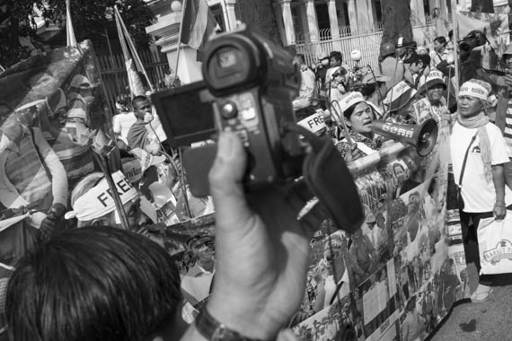 CAMBODIA. Phnom Penh. 10/02/2014: Tep Vanny, Land Rights Activist, and members of Boeung Kak lake and Borei Keila community protest in front of the Ministry of Justice and the appeals court. A whole series of simultaneous events were organised, both in Cambodia and in front of Cambodian embassies abroad, one day ahead of the appeal hearing to grant bail to 21 of the 23 people jailed during the violent crackdown by the army on striking workers this early january.