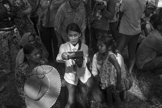 CAMBODIA. Sa'ang (Kandal). 26/02/2014: Social media reporter working during a meeting of about 600 CNRP supporters with Sam Rainsy and Kem Sokha, opposition CNRP co-Presidents.