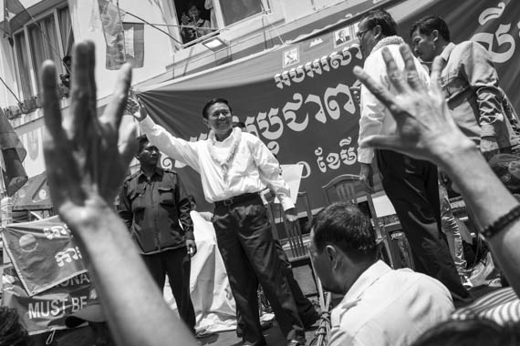 CAMBODIA. Phnom Penh 30/03/2014: Kem Sokha and Sam Rainsy, CNRP co-presidents, address CNRP supporters, after a march to the party headquarters following the commemoration ceremony for the 1997 grenades attack on a political rallye of 200 Sam Rainsy Party supporters during which 16 people were killed and more than 100 wounded.