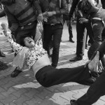 CAMBODIA. Phnom Penh 5/03/2014: Members from the former Boeung Kak Lake are arrested in front of City Hall while waiting for a group of land rights activists who plan to deliver an invitation to a ceremony for Women's Day.