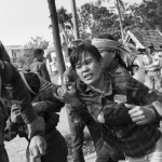 CAMBODIA. Phnom Penh 5/03/2014: Members from the former Boeung Kak Lake are arrested in front of City Hall while waiting for a group of land rights activists who plan to deliver an invitation to a ceremony for Women's Day.