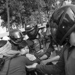 CAMBODIA. Phnom Penh 5/03/2014: Members from the former Boeung Kak Lake are arrested in front of City Hall while waiting for a group of land rights activists who plan to deliver an invitation to a ceremony for Women's Day.