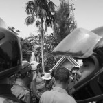 CAMBODIA. Phnom Penh 5/03/2014: Boeung Kak Lake land rights activists challenging the police to arrest them by climbing on a municipality truck when trying to deliver an invitation to a ceremony for International Women's Day.